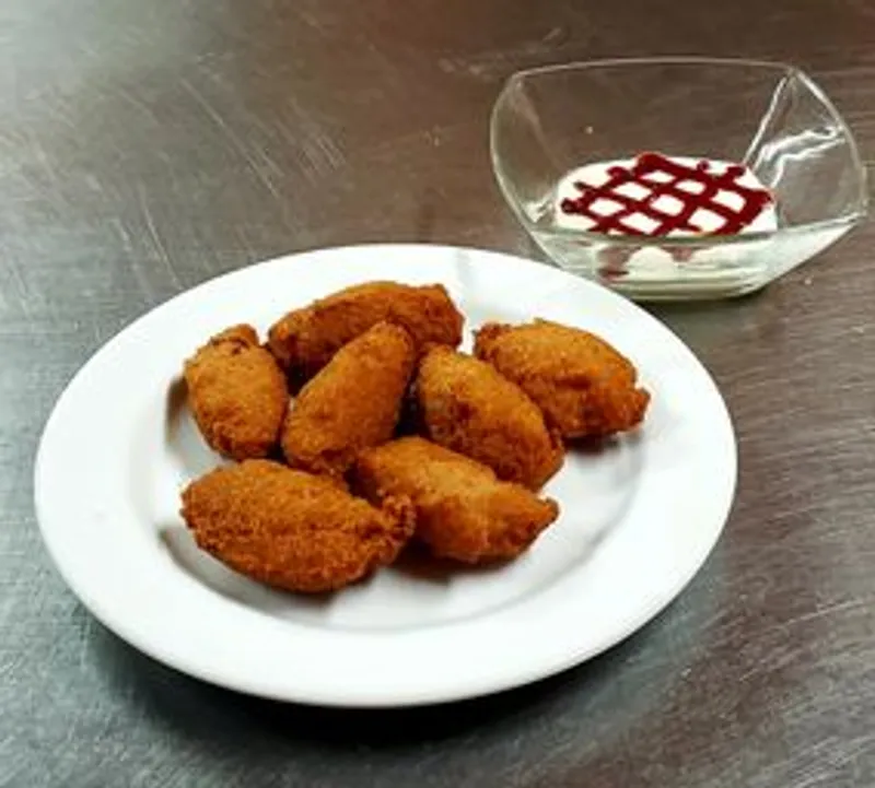 Buñuelos (malanga doughnuts)