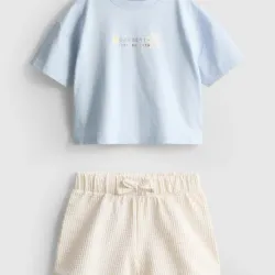 Conjunto de short y pulover azul