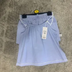 Conjunto de vuelitos y lazo