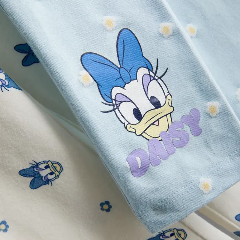 Leggings con diseños del personaje Daisy Duck de Disney.