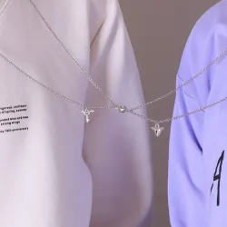 Cadenas de pareja con dijes de candado y llave y corazón imantado 