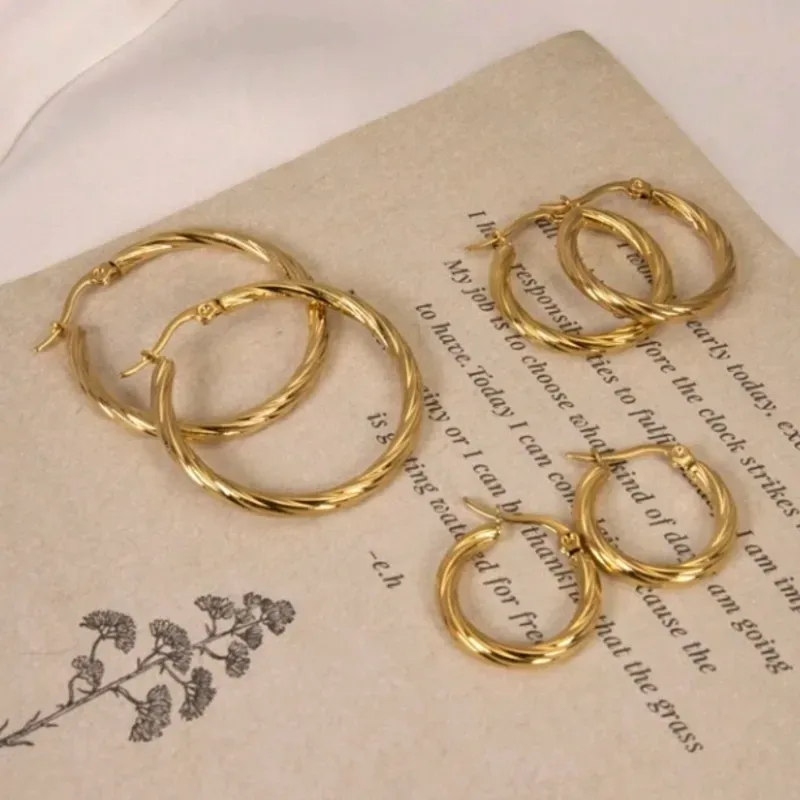 Argollas de acero inoxidable chapadas en oro 18