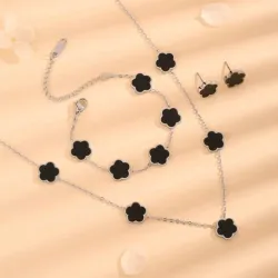 Juego de collar , pulsera y pendientes de acero inoxidable 