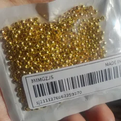 Paquete de 100 balines dorados
