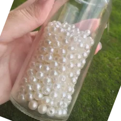 Paquete de 100 Perlas blancas de 6 mm