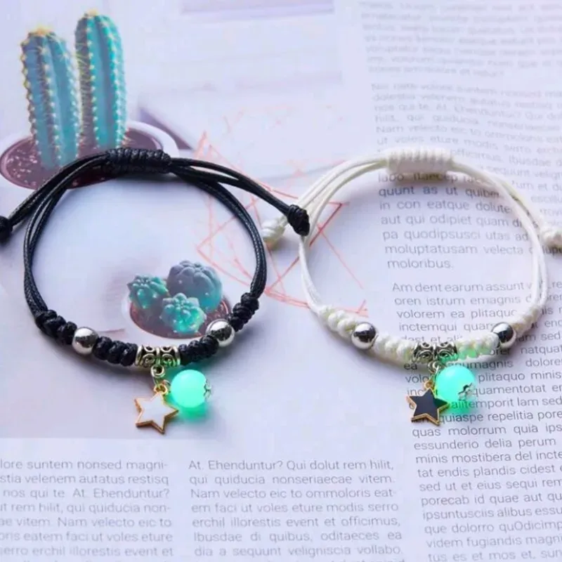 Pareja de pulseras lumínicas con dije de estrella