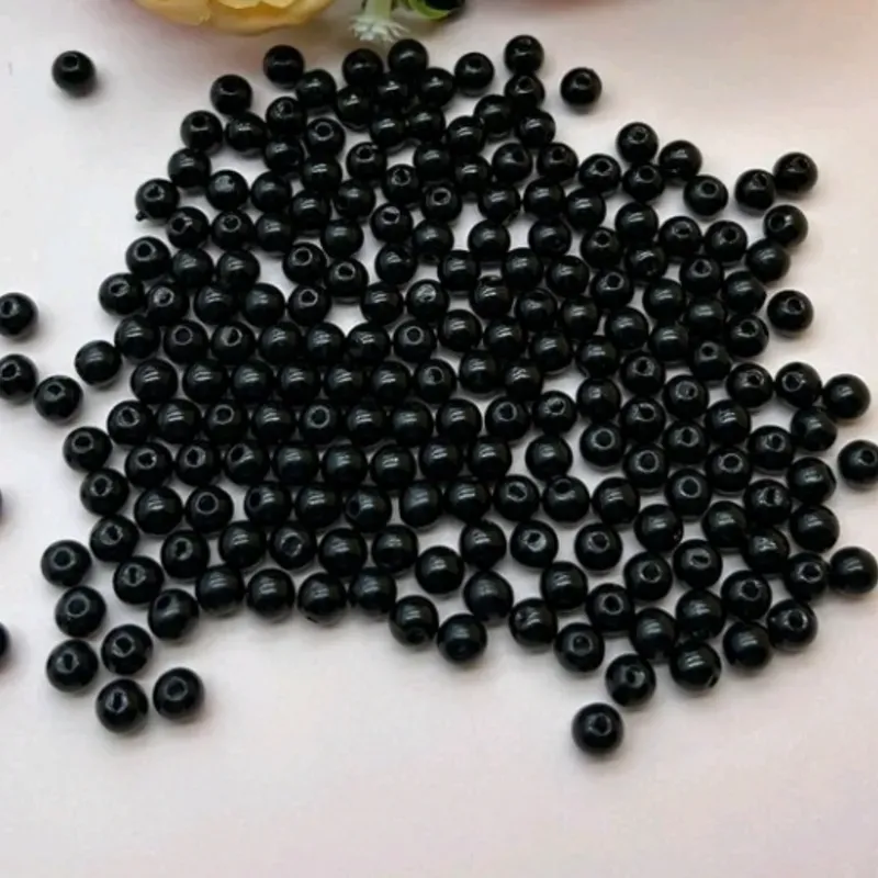 Perlas plasticas negras de 6 mm