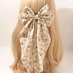 Lazo de pelo beige