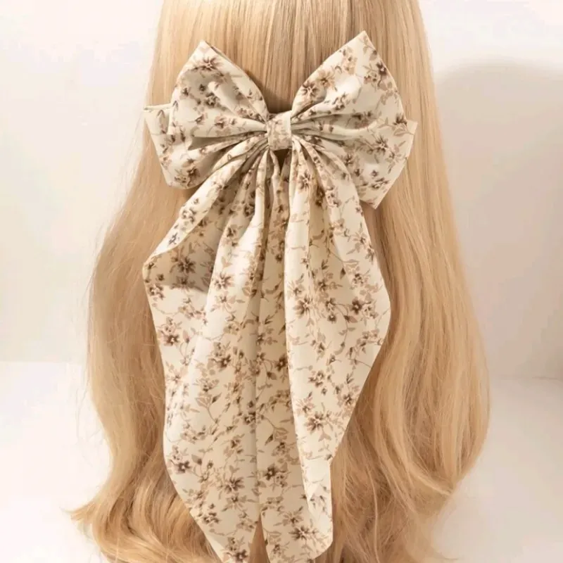 Lazo de pelo beige