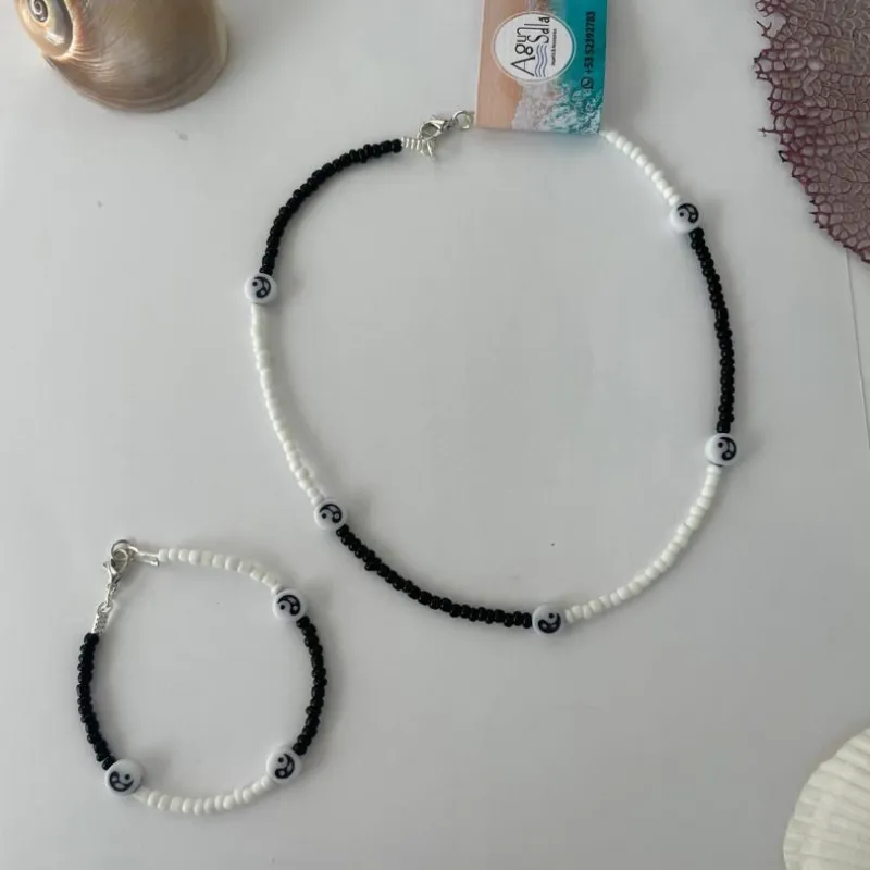 Juego de collar y pulsera yin y yang 