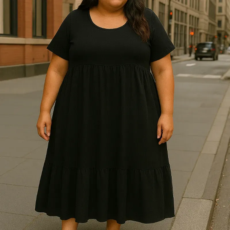 Vestido con mangas y vuelo inferior. Negro