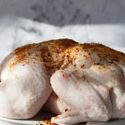 Pollo entero Condimentado ( pesan de 4 a 5 libras)