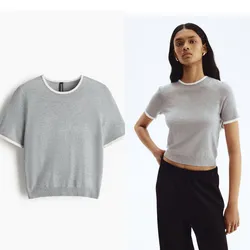 Pulover gris con bordes blancos