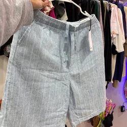 Short de tela largo azul