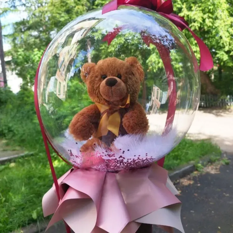 Peluche dentro de globo burbuja 