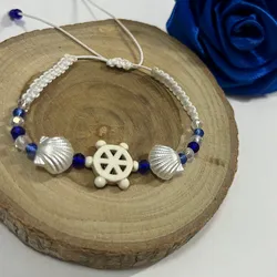 Pulsera de timón con conchas perladas