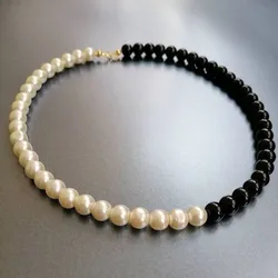 collar blanco y negro de perlas🖤🤍
