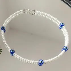 collar de perlas blancas con ojo turco (varios)🧿