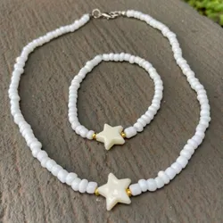 collar y pulsera de cuentas blancas con estrellita⭐️