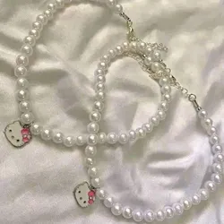 collares de perlas con dije de hello kitty🩷