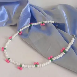 gargantilla de cuentas blancas con cerecitas🍒