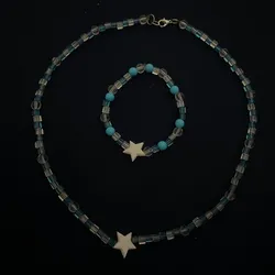 gargantilla y pulso se cristales con perlas transparentes y estrella de color🩵
