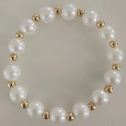 perlas blancas y balines dorados💛