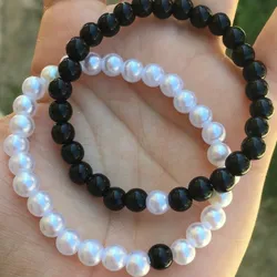 pulseras de perlas blancas y negras🤍🖤