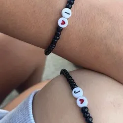 pulseras negras con corazon e inicial🖤