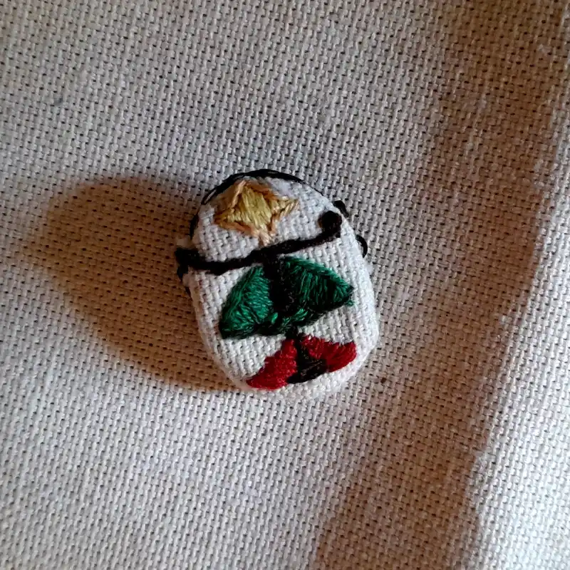 Broche "Génesis"