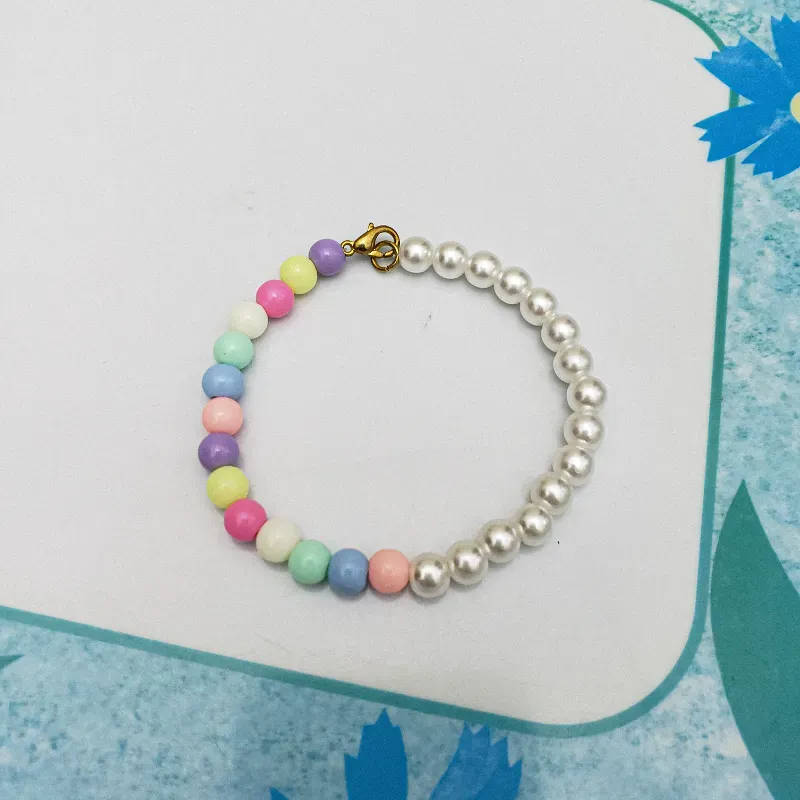 Pulsera mitad perlas mitad bolitas de colores