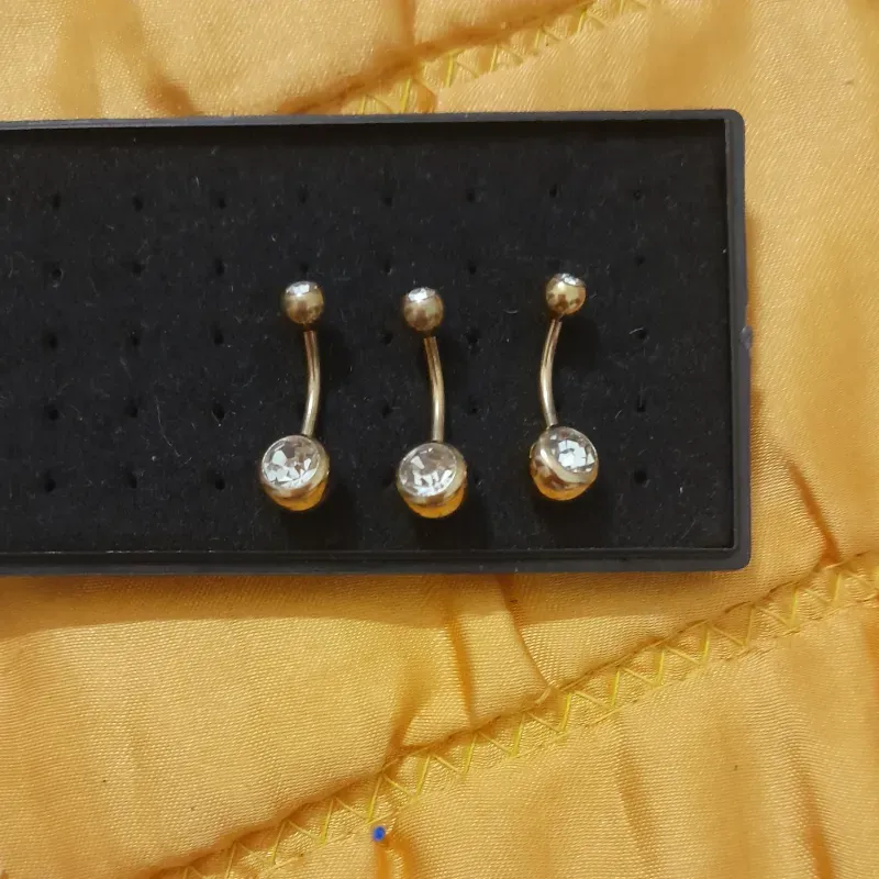 Pircing hombligo