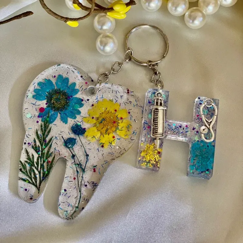 Llaveros con forma de muela para Odontólogas