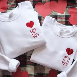 Pareja de pulovers blancos