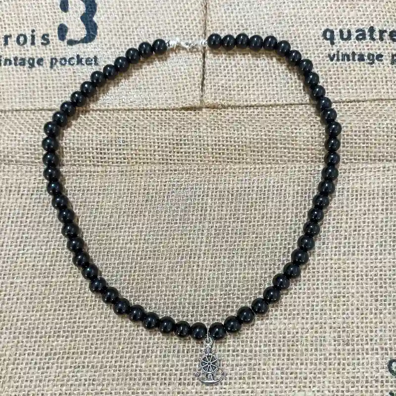 Collar de perlas con dije