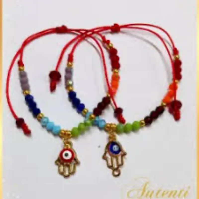 7 chacras con swaroskys y mano de fátima con ojo turco 