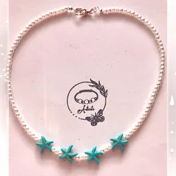 Collar de perlas con estrellas de mar 