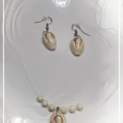 Juego de colgante y aretes de caracol 