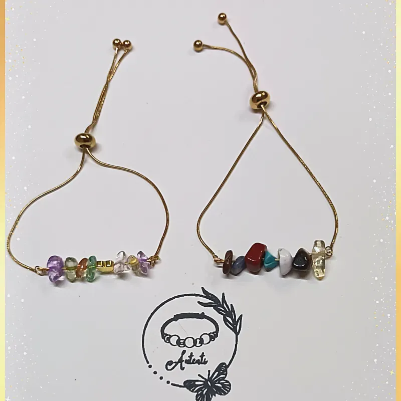 Pulsis de acero con chics de piedras 
