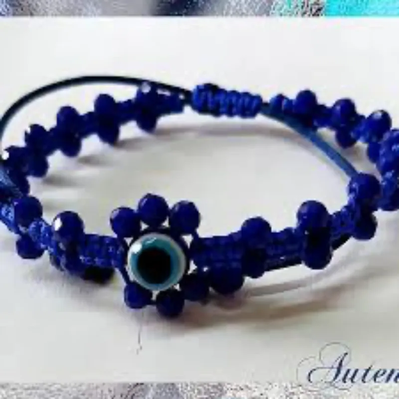 Pulso ojos turco tejido y swarosky azul 