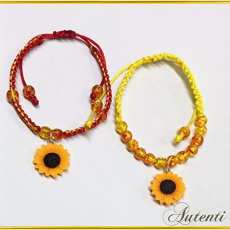 Pulsos tejisos con perlas y girasol 