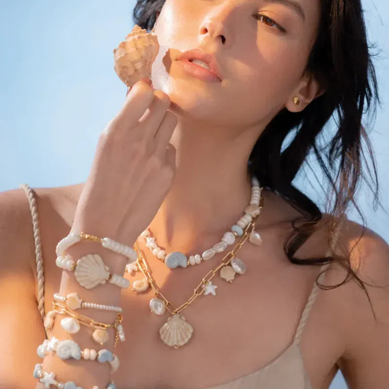 Pulsera 2 en 1 Caracoles + Aretes