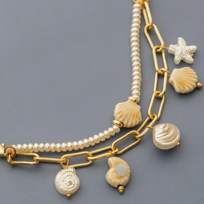 Pulsera 2 en 1 Caracoles + Aretes