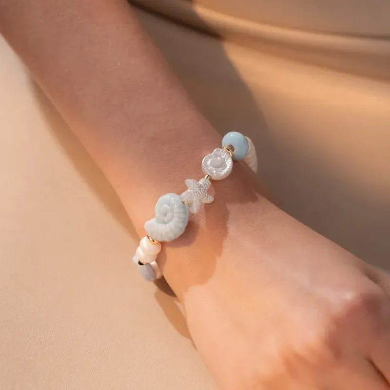 Pulsera Caracol + Aretes