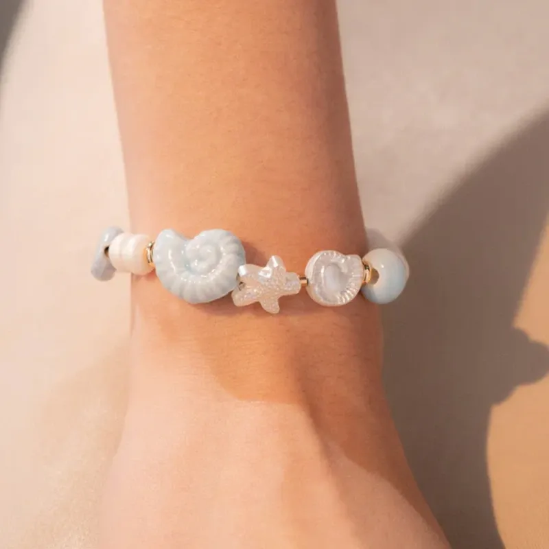 Pulsera Caracol + Aretes