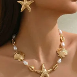 Conjunto de collar con aretes de estrellas color dorado