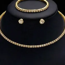 Conjunto dorado de perlas