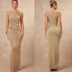 Vestido beich largo con detalle dorado