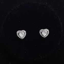 Aretes de corazón de brillo blanco