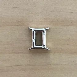 Charm de Geminis